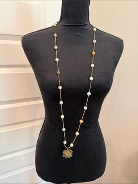 Long Gold Bead Necklace with Multicolor Beads and Sun Medallion